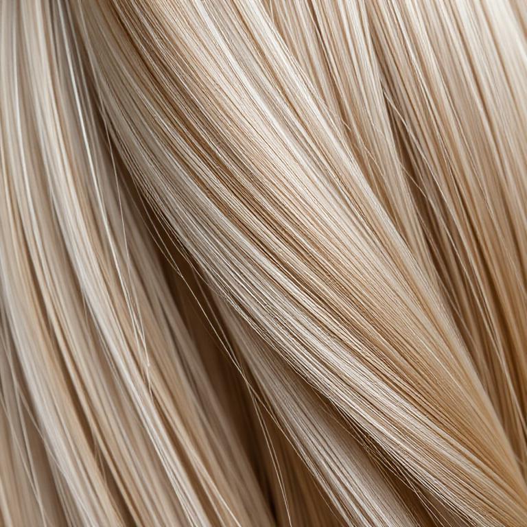 Mushroom Blonde hair colour reference — Cool, smoky blonde with a diffused, seamless root shadow.